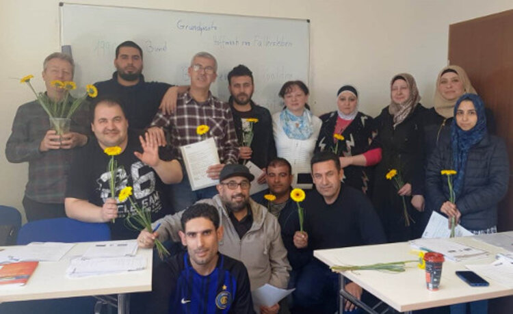 Erfolgreicher Abschluss des Alphabetisierungskurses